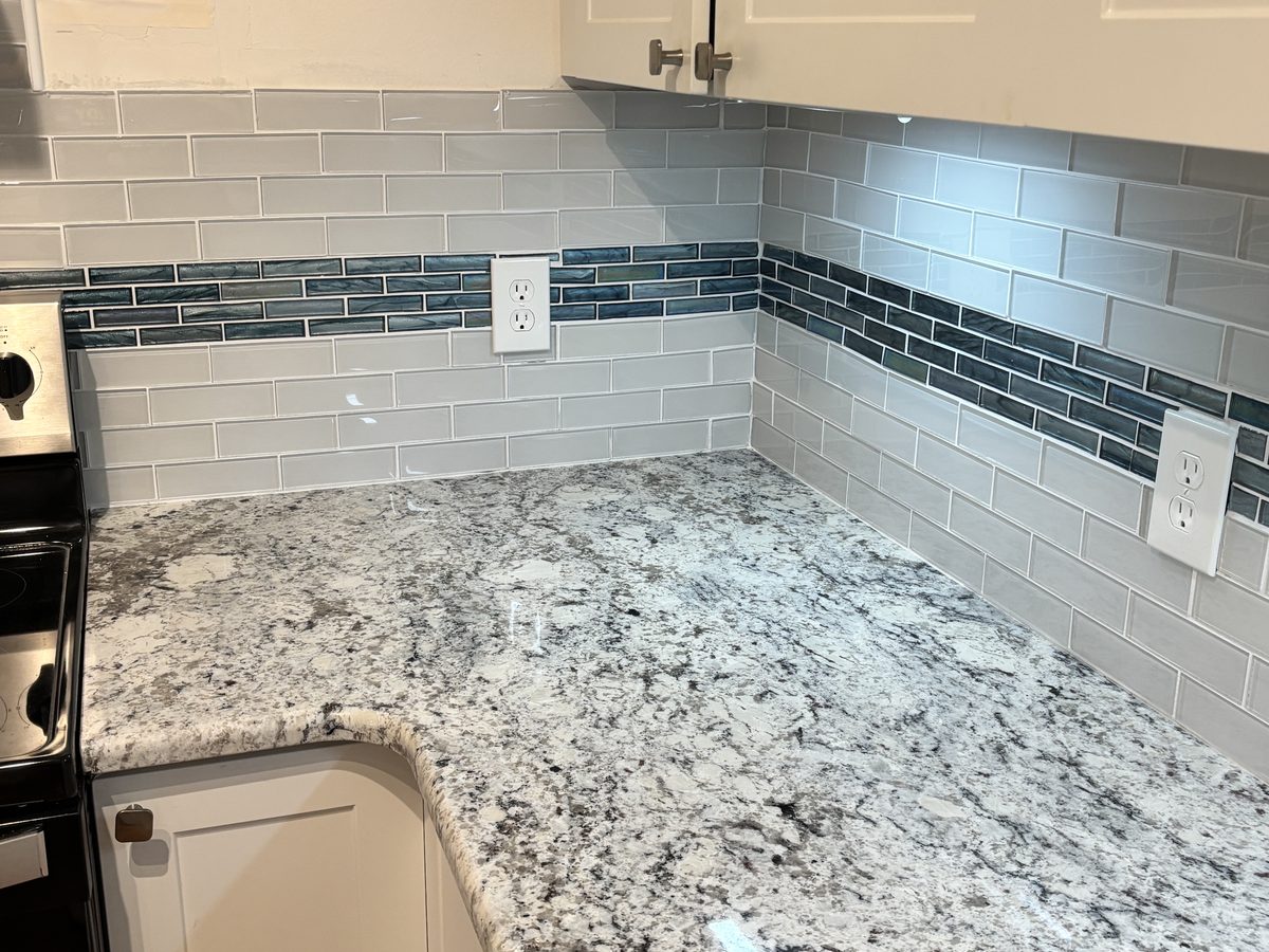 New kitchen tile backsplash and granite countertop detail